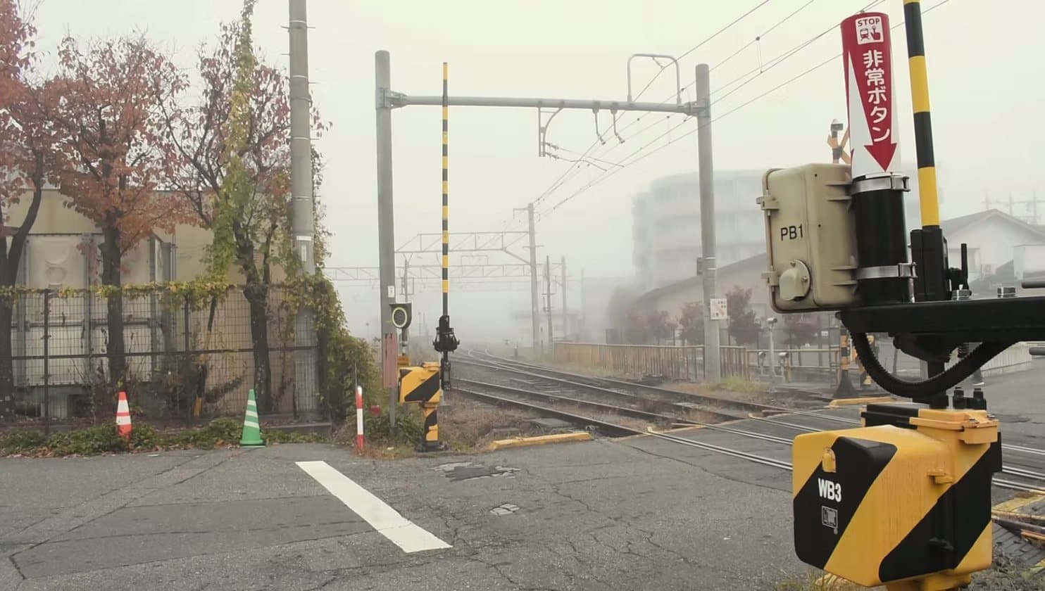 A level crossing in the Japanese fog
